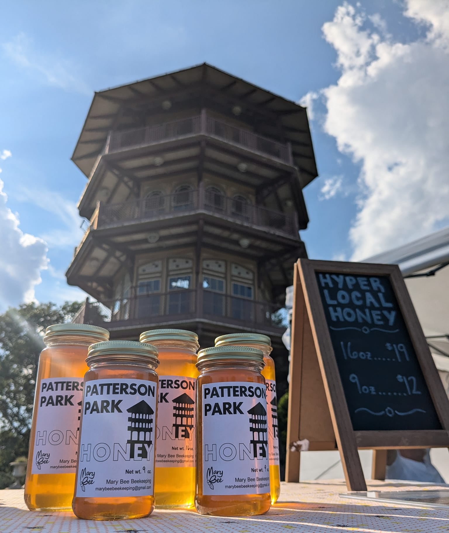 Jars of local honey in front of the Patterson Park Observatory.